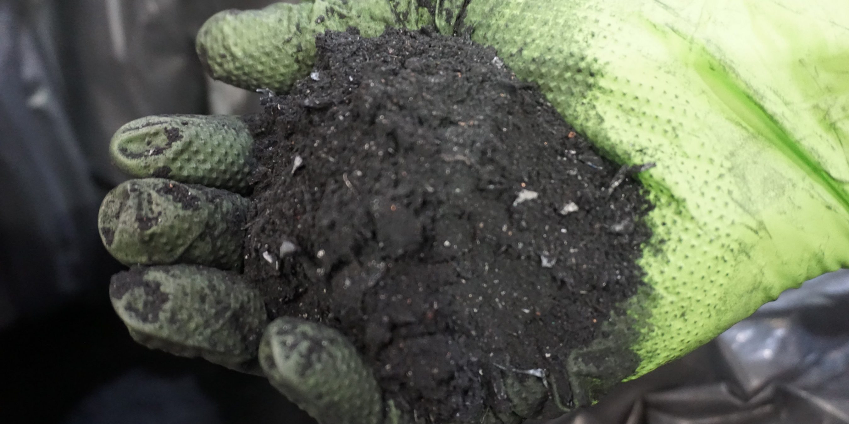 pix-High-shot-gloved-hand-with-pulverised-batteries-2700×1350