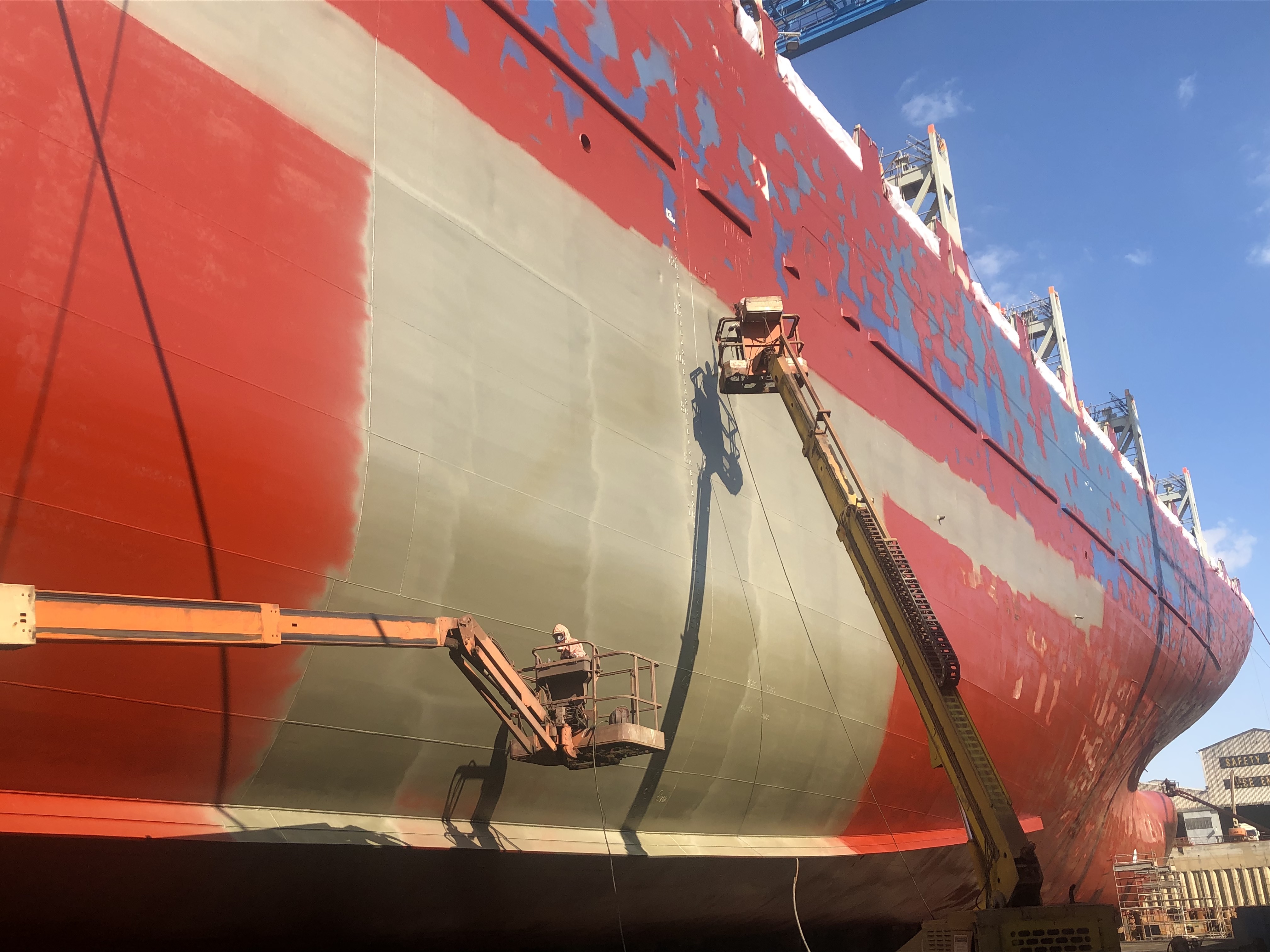 pix – Talga’s Talnode being applied to the hull of the container ship Algarrabo