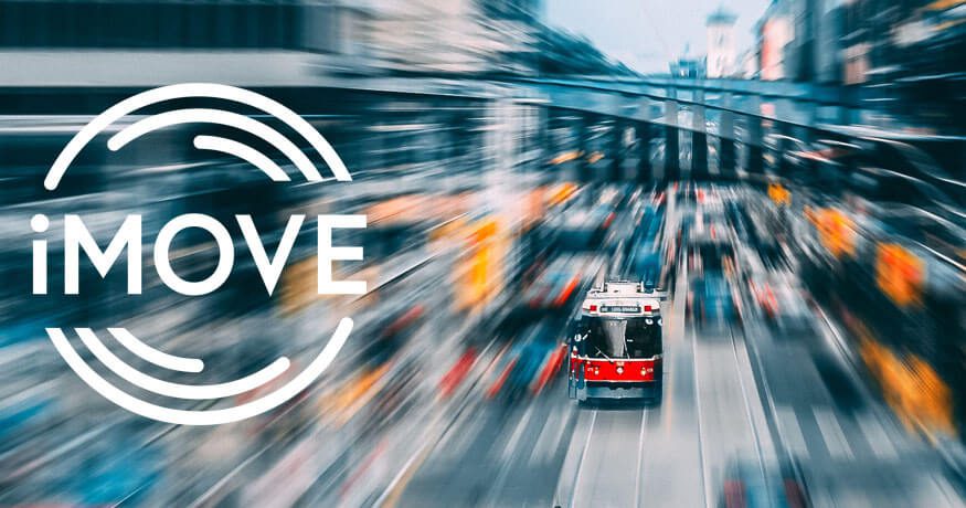 iMOVE-logo-on-city-motion-blur-V1