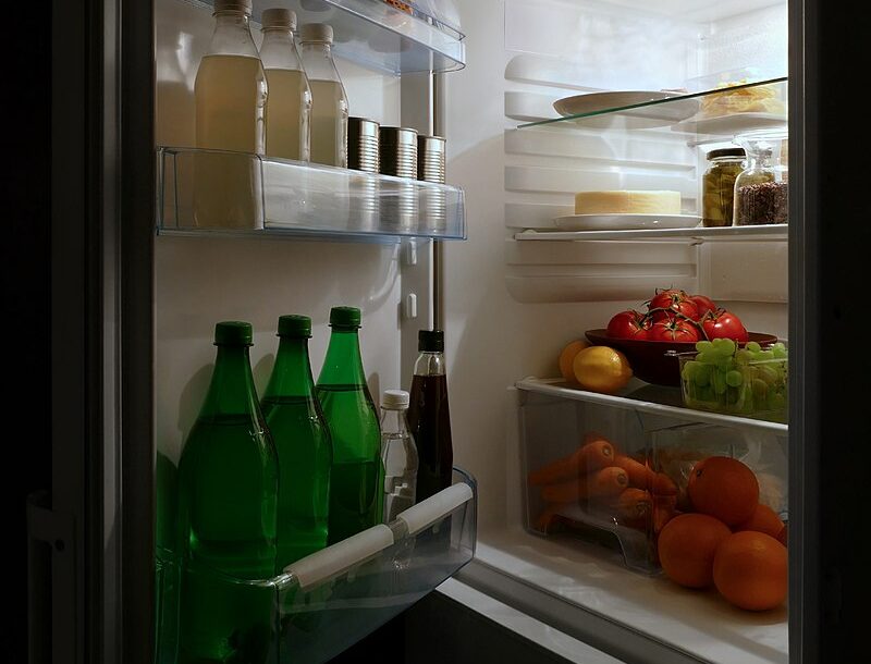 Open_refrigerator_with_food_at_night